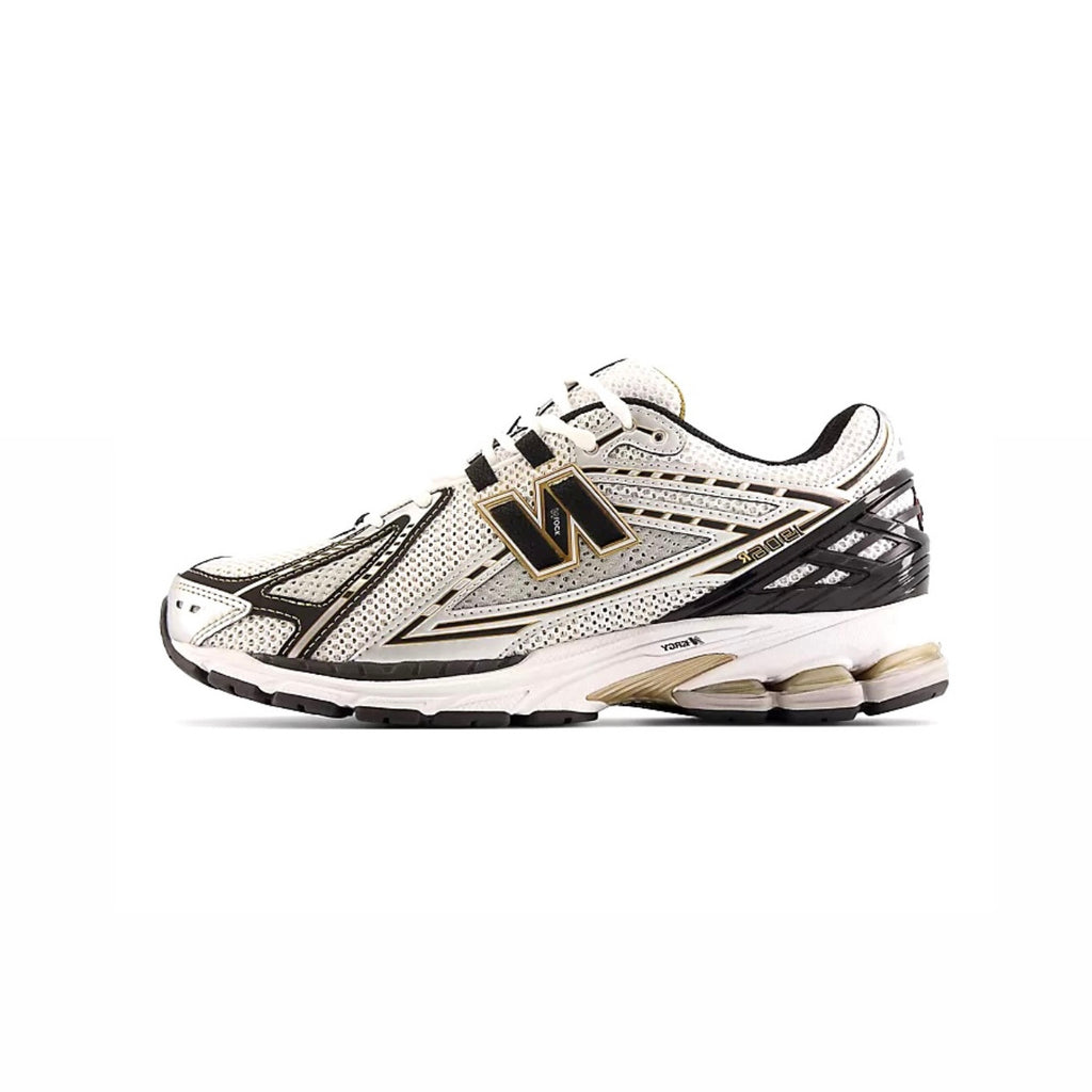 New Balance 1906R “ Metallic Silver con Metallic Gold